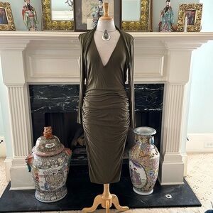 NWT “VENUS” olive dress with deep v-neck and side sheering. Amazing lines!